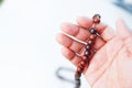 Man hand holding a muslim rosery beads, Royalty Free Stock Photo