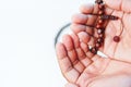 Man hand holding a muslim rosery beads, Royalty Free Stock Photo