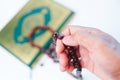 Man hand holding a muslim rosery beads, Royalty Free Stock Photo