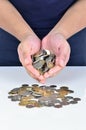 Man hand holding pile of coins Royalty Free Stock Photo