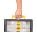 Man hand holding plastic tool box. Royalty Free Stock Photo