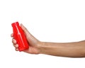 A Man hand holding red bottle isolated on white background. Royalty Free Stock Photo