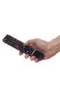 Man hand holding remote control Royalty Free Stock Photo