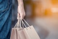 Man hand holding shopping bags on the street Royalty Free Stock Photo