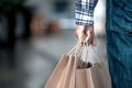Man hand holding shopping bags on the street Royalty Free Stock Photo
