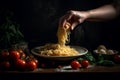 Man hand holding spaghetti, in the dark kitchen