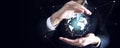 Man hand holding virtual sphere globe Royalty Free Stock Photo