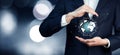 Man hand holding virtual sphere globe Royalty Free Stock Photo