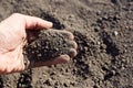 The man in the hand holds the earth a little crumbles, the idea of the photo the soil is our life and nurse Royalty Free Stock Photo