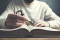 Man hand key and book Royalty Free Stock Photo