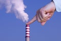 Man with hand making stop to pollution