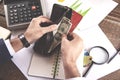 Man hand money with wallet and calculator Royalty Free Stock Photo