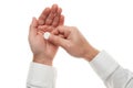 Man hand with one big white pill isolated on white background. White shirt, business style. Medicament and food supplement for Royalty Free Stock Photo