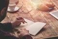 Man hand with pen writing on notebook on wooden table Royalty Free Stock Photo