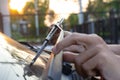 Man hand picking up car windscreen wiper..Technician changing windshield wipers blade. Mechanic check, replacing old wiper blade