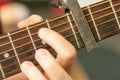 Man hand playing acoustic guitar strings recreation concept Royalty Free Stock Photo