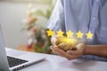 Man hand with popup five star icon for feedback review satisfaction service, Customer services best excellent business rating Royalty Free Stock Photo