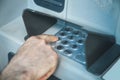 Man hand pressing on ATM machine keypad. ATM. Withdraw money Royalty Free Stock Photo