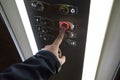 Man hand pressing button on elevator Royalty Free Stock Photo