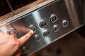 Man hand is pressing elevator button Royalty Free Stock Photo