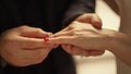 Man hand putting ring on girl finger. Unknown man taking woman hand outdoors Royalty Free Stock Photo