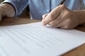 Man hand signing a contract, close up view Royalty Free Stock Photo