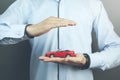 Man hand  small red car Royalty Free Stock Photo