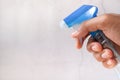 Man hand with spray bottle cleaning, close up Royalty Free Stock Photo