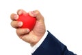 A man hand squeezing a stress ball Royalty Free Stock Photo