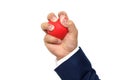 A man hand squeezing a stress ball Royalty Free Stock Photo