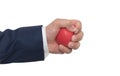 A man hand squeezing a stress ball Royalty Free Stock Photo