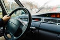 Man hand on steering wheel driving car. Royalty Free Stock Photo