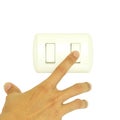 Man hand turn off light switch isolated on white background, Eco friendly concept Royalty Free Stock Photo