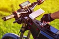 Man hand turning ignition key on ebike Royalty Free Stock Photo