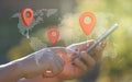 Man Hand Using Smartphone With Red Pin Point World Map GPS Navigator Icon Royalty Free Stock Photo