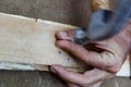 Man hand working whit a hammer on wood Royalty Free Stock Photo