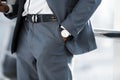 Man Hand with Wrist Watch in the Pocket of Stylish Pants