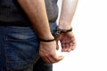 The man is handcuffed, his hands behind his back, the caught criminal Royalty Free Stock Photo