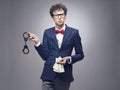 Man with handcuffs and money Royalty Free Stock Photo