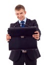 Man handing a brief case Royalty Free Stock Photo