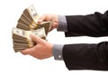 Man Handing Over Hundreds of Dollars Royalty Free Stock Photo