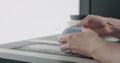 Man hands check bottom of blue ceramic bowl