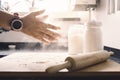 Man hands clapping with flour on the kitchen table Royalty Free Stock Photo