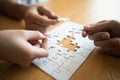 Man hands connecting couple puzzle piece in office. Business solutions, target, successful, goals and strategy Royalty Free Stock Photo