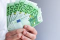 Man hands counting us euro banknotes. Counting or spend money. Selective focus. Close-up Royalty Free Stock Photo