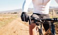 Man hands, gloves and bicycle cycling for training, triathlon sports and cardio transportation. Closeup cyclist, bike