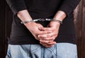 Man hands in handcuffs Royalty Free Stock Photo