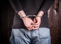 Man hands in handcuffs Royalty Free Stock Photo