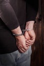Man hands in handcuffs Royalty Free Stock Photo
