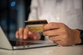 man hands holding credit card using internet payment laptop computer, online shopping digital banking, Business financial Royalty Free Stock Photo